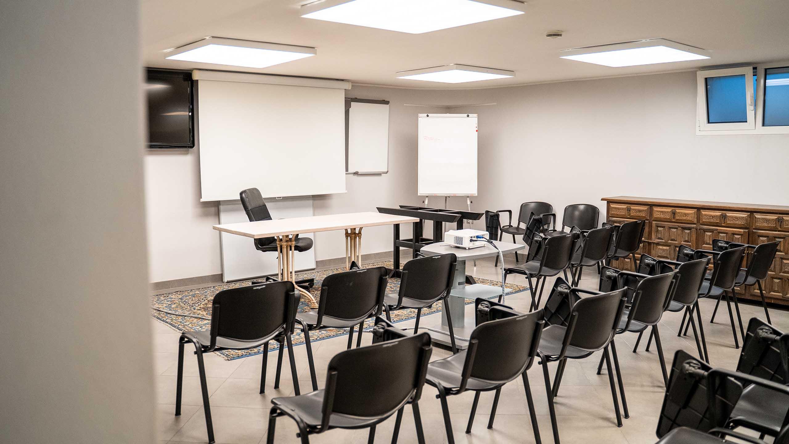 Sala meeting con maxi schermo al plasma