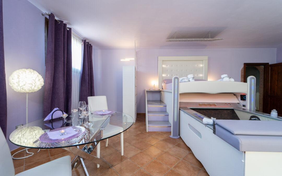 Junior Suite Dante & Beatrice con angolo relax e patio esterno